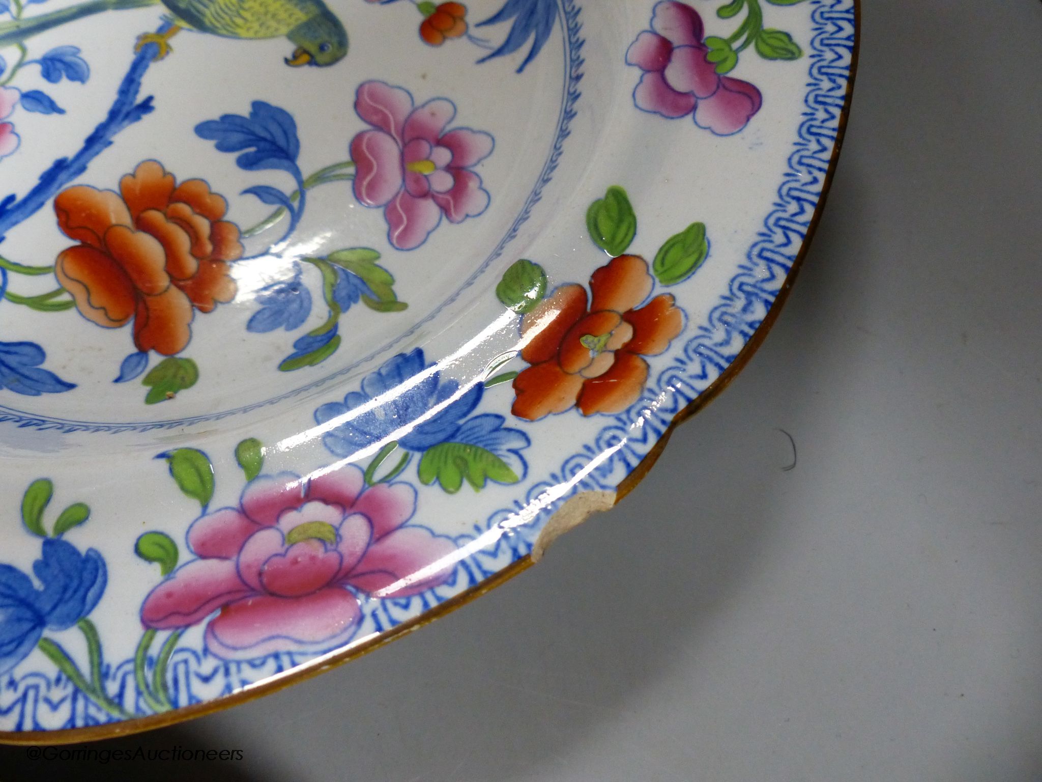 A Moroccan terracotta dish, an Ironstone dish, a green and white leaf dish, largest 30cm